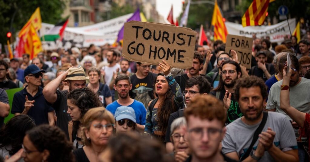 Barcelona Visitors Sprayed By Water Guns As Residents Protest Glut Of Tourism