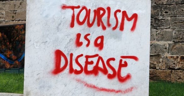 ‘It’s Tourist Hunting Season’: The Street Art That’s Seething About Mass Tourism