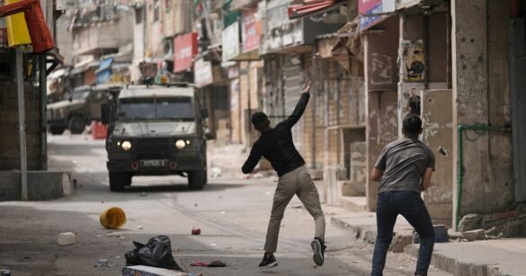 Israeli Strike On Gaza Apartment Building Kills At Least 23, Officials Say